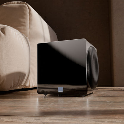 3000 Micro R|Evolution Piano Gloss Black by the Couch on hardwood floor
